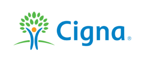 "Cigna" written in blue with an illustration of a person lifting their arms up into the air. The same illustration also resembles a tree.