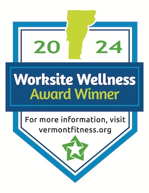 worksite wellness 2024 award winner logo. for more information, visit vermontfitness.org. logo includes a green shape of Vermont on top and a star on the bottom. Whole graphic is a down arrow shape.